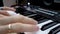 Hands of Musician Playing Keyboard Piano Synthesizer