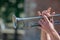 Hands of the musician playing a trumpet. close up musician with trombone on a public event