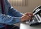 Hands of office worker typing on the keyboard