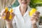 Hands of old elderly doing finger,palm and wrist exercise with rubber ball,spring hand gripper,stretch finger,squeeze with hand