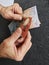 hands of an older man counting australian banknotes