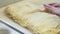 Hands pastry chef prepares the dough