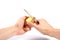 hands peel potato with knife