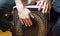 Hands playing percussion with a Flamenco box