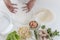 Hands preparing homemade dim-sum asian dumplings buns