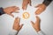 Hands reaching for bitcoin symbol