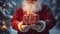 hands of santa claus with gift box