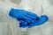 hands of scientists wearing protective suit and face mask diagnosis vaccine virus in science clinical