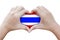 Hands in the shape of heart with symbols of the flag of Thailand