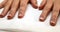 Hands showing fresh french manicure