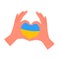 Hands showing heart gesture in support of Ukraine, person with patriotic message