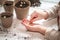 Hands of a small child planted seeds at home. Seeds of courgette or pumpkin in open palm of child. Earth day concept. nurturing