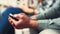 Hands, smartphone and group of business people in a row on mobile technology in creative startup office. Closeup, phone