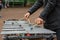 Hands of street musician playing the chromatic glockenspiel (metallophone).