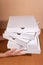 Hands stretching boxes with pizza home delivery