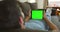 Hands, tablet and green screen in home living room, social media and mockup space. Closeup, technology and man with