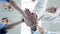 Hands, teamwork or doctors in huddle with support in collaboration for healthcare goals together. Hospital closeup