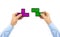 Hands with tetris toy blocks