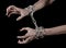 Hands tied chain, kidnapping, dependence, loneliness, social problem, halloween theme, black background