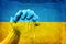 Hands on Ukrainian Flag