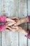 Hands of unrecognizable grandmother and her granddaughter