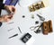 The hands of a watchmaker repairing a mechanical watch.