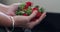 Hands, water and a person washing strawberries in the kitchen sink of a home closeup for hygiene. Food, diet and