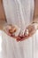 Hands Of A Woman Holding Crystals