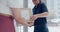 Hands, woman and sign for delivery of box for ecommerce, distribution and online shopping. Courier, package and