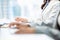 Hands of woman white collar workers typing on computer keyboards