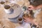 hands of a woman working ceramic handicrafts in her workshop