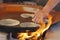 Hands women make traditional food tortilla