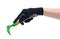 Hands in working gloves holding gardening tool rake