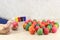 Hands of young christian coloring eggs on marble top background preparing for easter day.