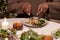 Hands of young man cutting piece of chicken on plate