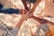 Hands of young people on stack at beach