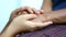 Hands of young woman holding and gentle touch to Hands of old women metaphor and concept for body language feeling love soothe and