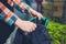 Hands of young woman opening rucksack