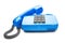 Handset lies on a blue landline phone