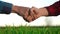 handshake agriculture. hands of group farmer business make a contract in the field. farmer handshake shaking hands on