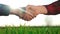 Handshake agriculture. Hands of group farmer business make a contract in the field. Farmer handshake shaking hands on