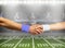 handshake of american football players