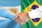 Handshake on Argentina and Brazil flag background