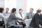 Handshake business people at a seminar in the conference room.