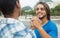 Handshake of a caucasian man with african american friend