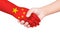 Handshake between a child and China