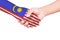 Handshake between a child and Malaysia