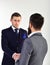 Handshake concept. Businessmen, business partners meeting, white background. Business partners on serious faces