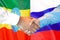 Handshake on Ethiopia and Russia flag background