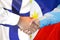 Handshake on Finland and Philippines flag background